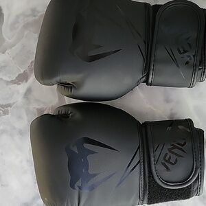 8oz. black Venum mma boxing gloves
